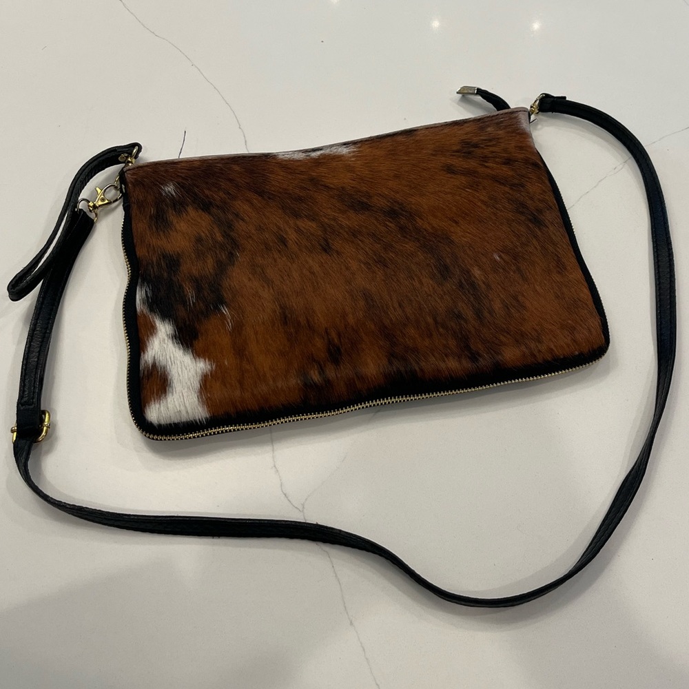 Leather and cowhide cross body purse. Black leather